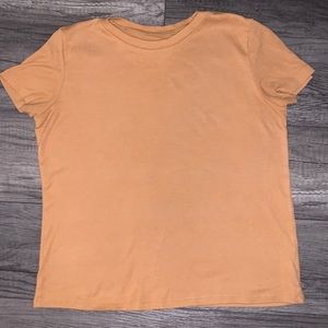 American Eagle t shirt size extra small colour dark yellow